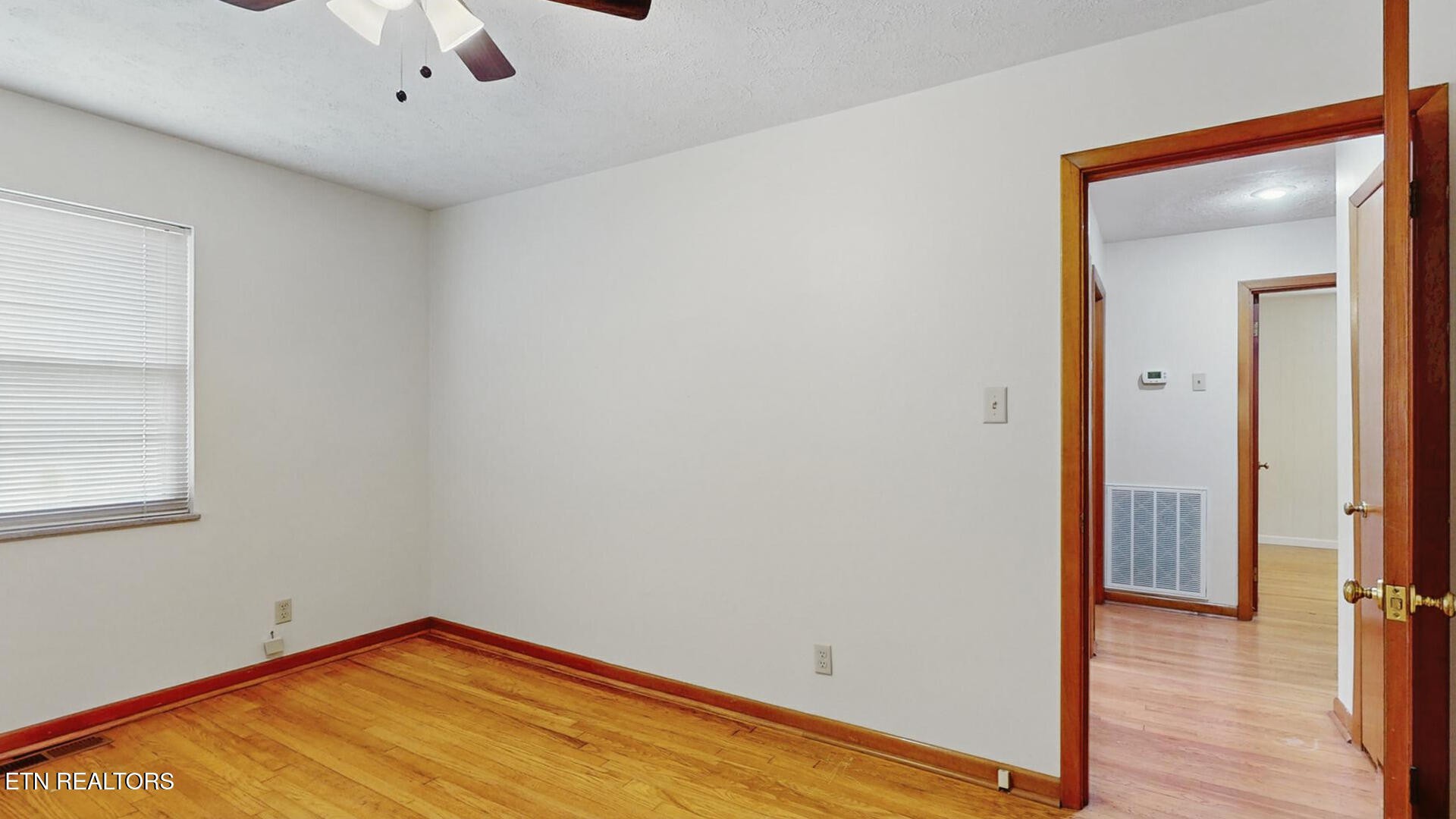4004 Deerfield Road Knoxville, TN 37921 - Photo 25 of 34 a view of empty room with wooden floor