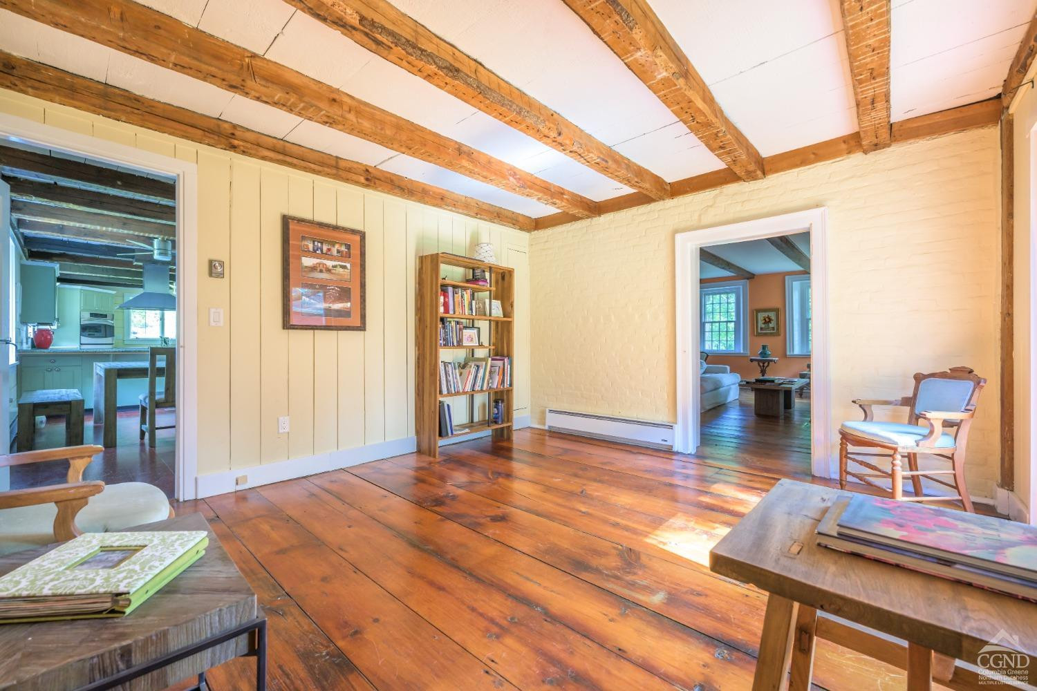 2221 Highway 9 Kinderhook, NY 12106 - Photo 18 of 41 a room with furniture and wooden floor