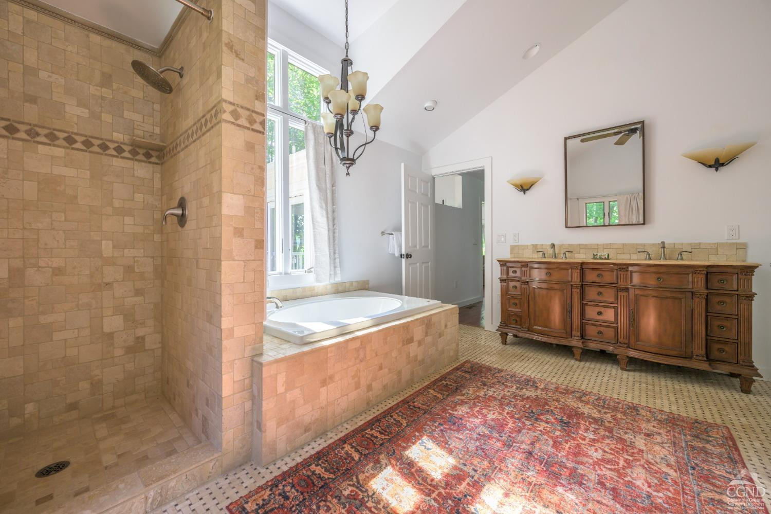 2221 Highway 9 Kinderhook, NY 12106 - Photo 22 of 41 a spacious bathroom with a tub sink and mirror