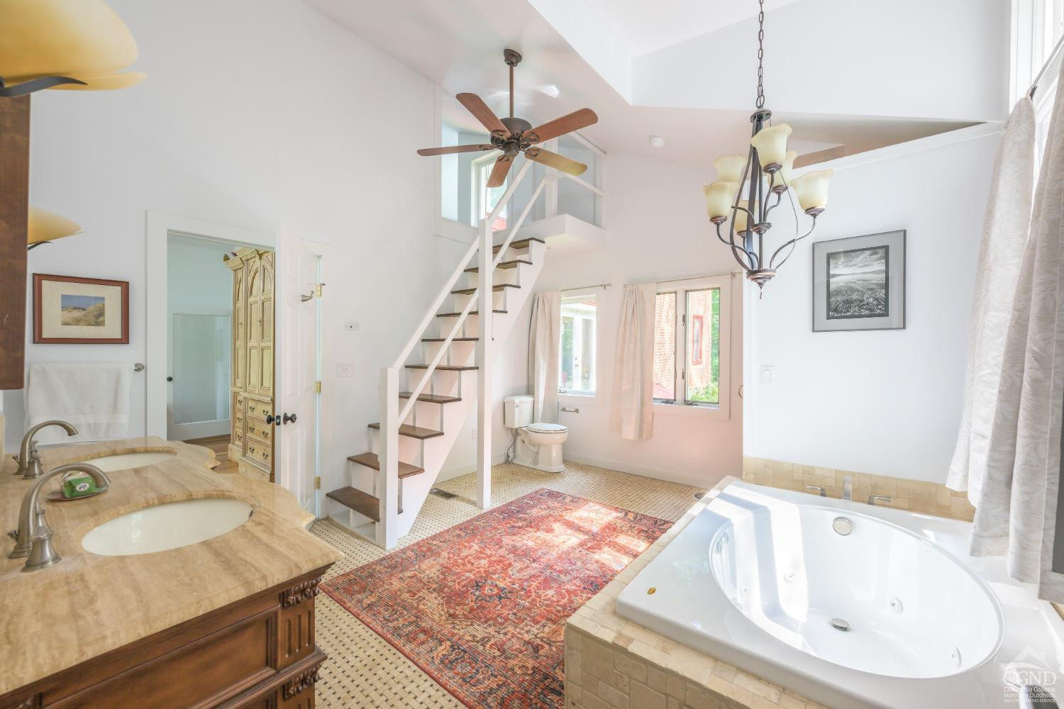 2221 Highway 9 Kinderhook, NY 12106 - Photo 23 of 41 a bathroom with a granite countertop sink a mirror and a bathtub