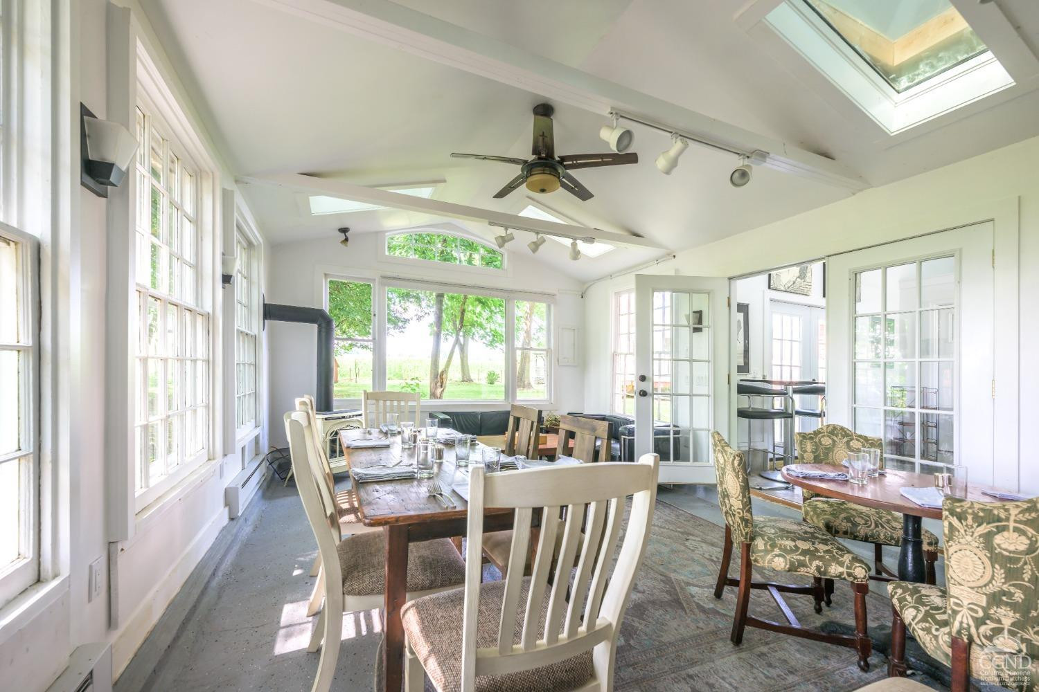 2221 Highway 9 Kinderhook, NY 12106 - Photo 34 of 41 a view of a dining room with furniture window and outside view