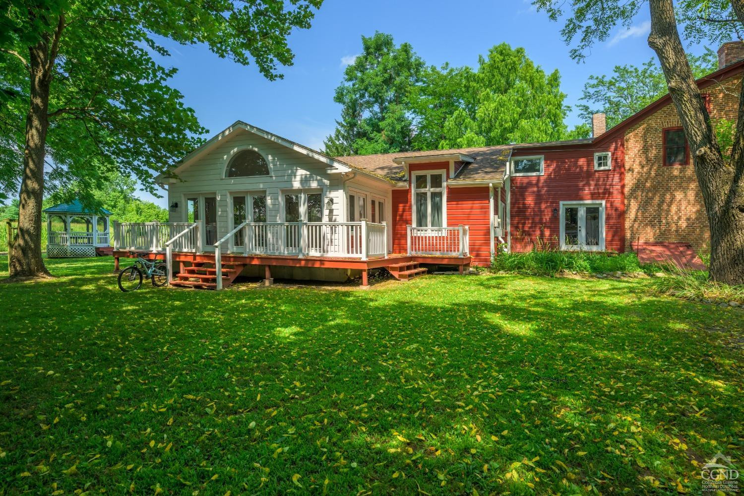 2221 Highway 9 Kinderhook, NY 12106 - Photo 5 of 41 a front view of house with yard and green space