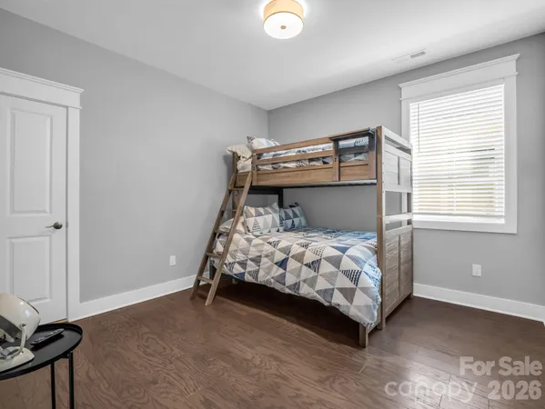 a spacious bathroom with a sink a large mirror and a bathtub