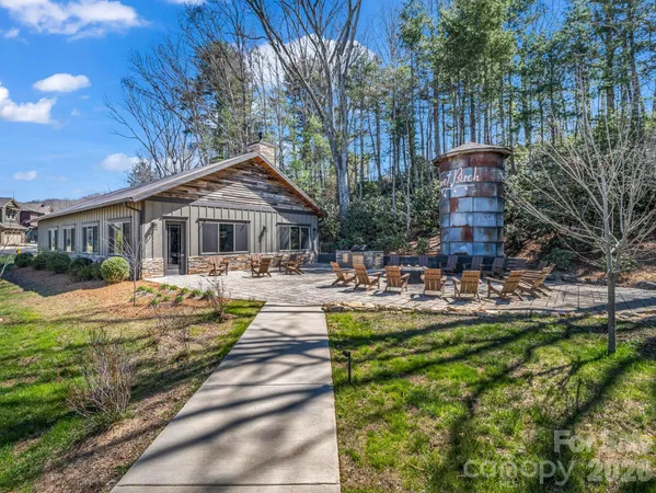 a view of a street with a building in the background