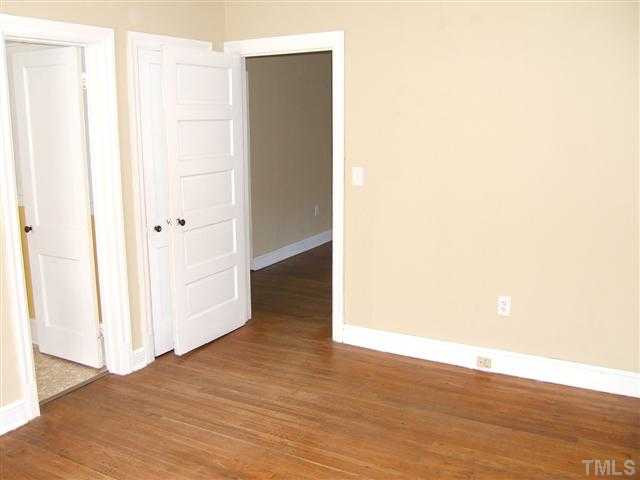 508 Phelps Avenue Raleigh, NC 27607 - Photo 5 of 7 a view of a hallway with wooden floor