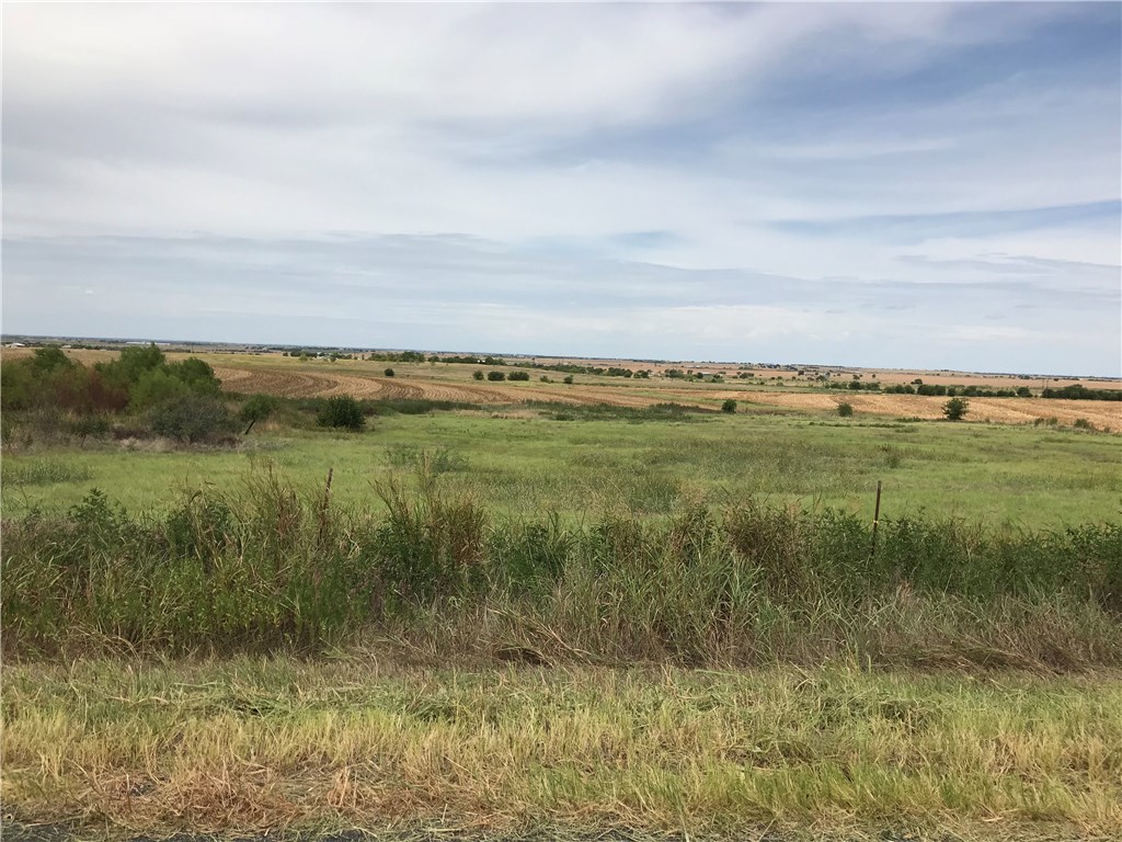 Lot 8 Lund - Carlson Road Elgin, TX 78621 - Photo 1 of 1 a view of a lake with a yard