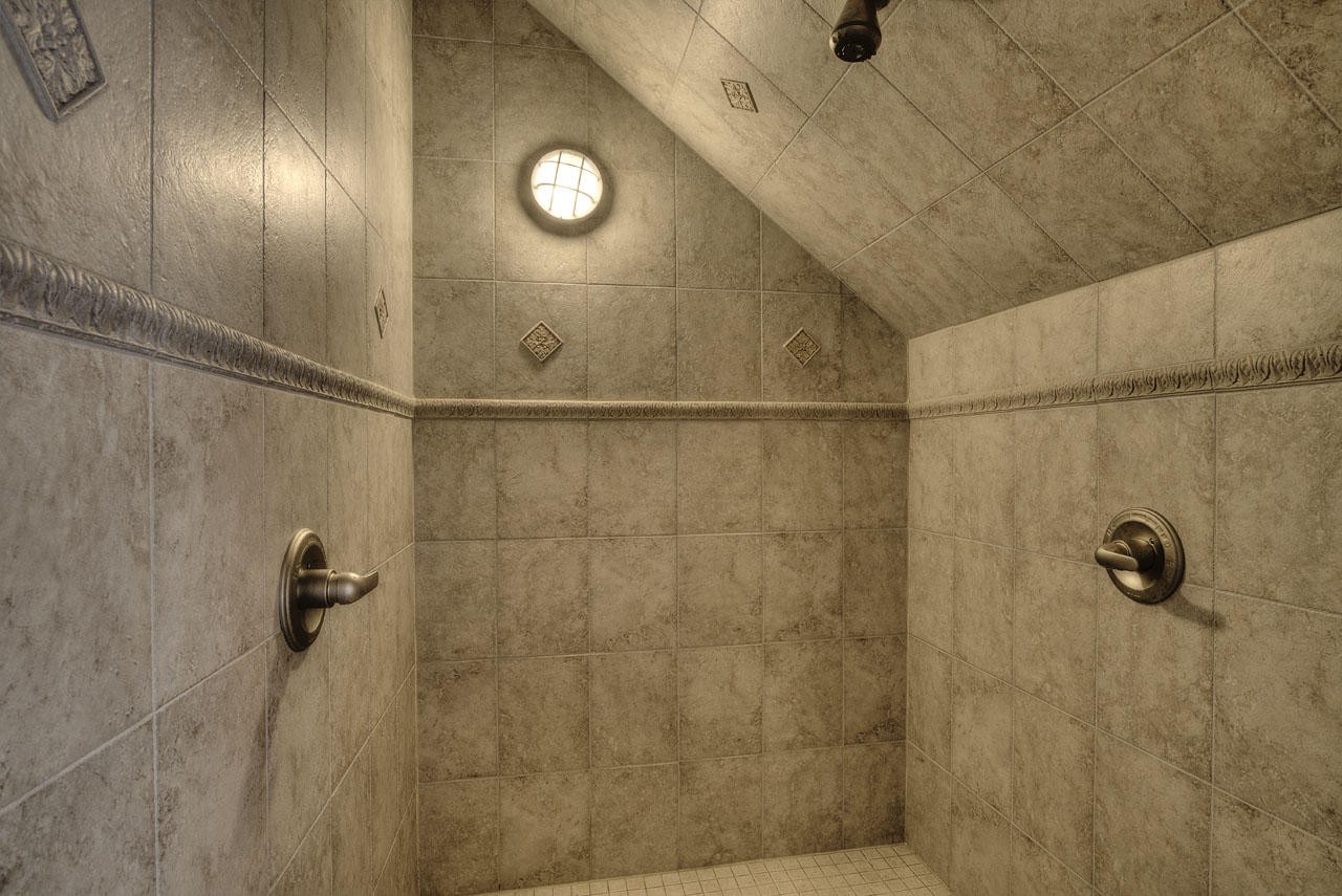 2602 Sharpes Ridge Way Sevierville, TN 37876 - Photo 24 of 28 a bathroom with a shower