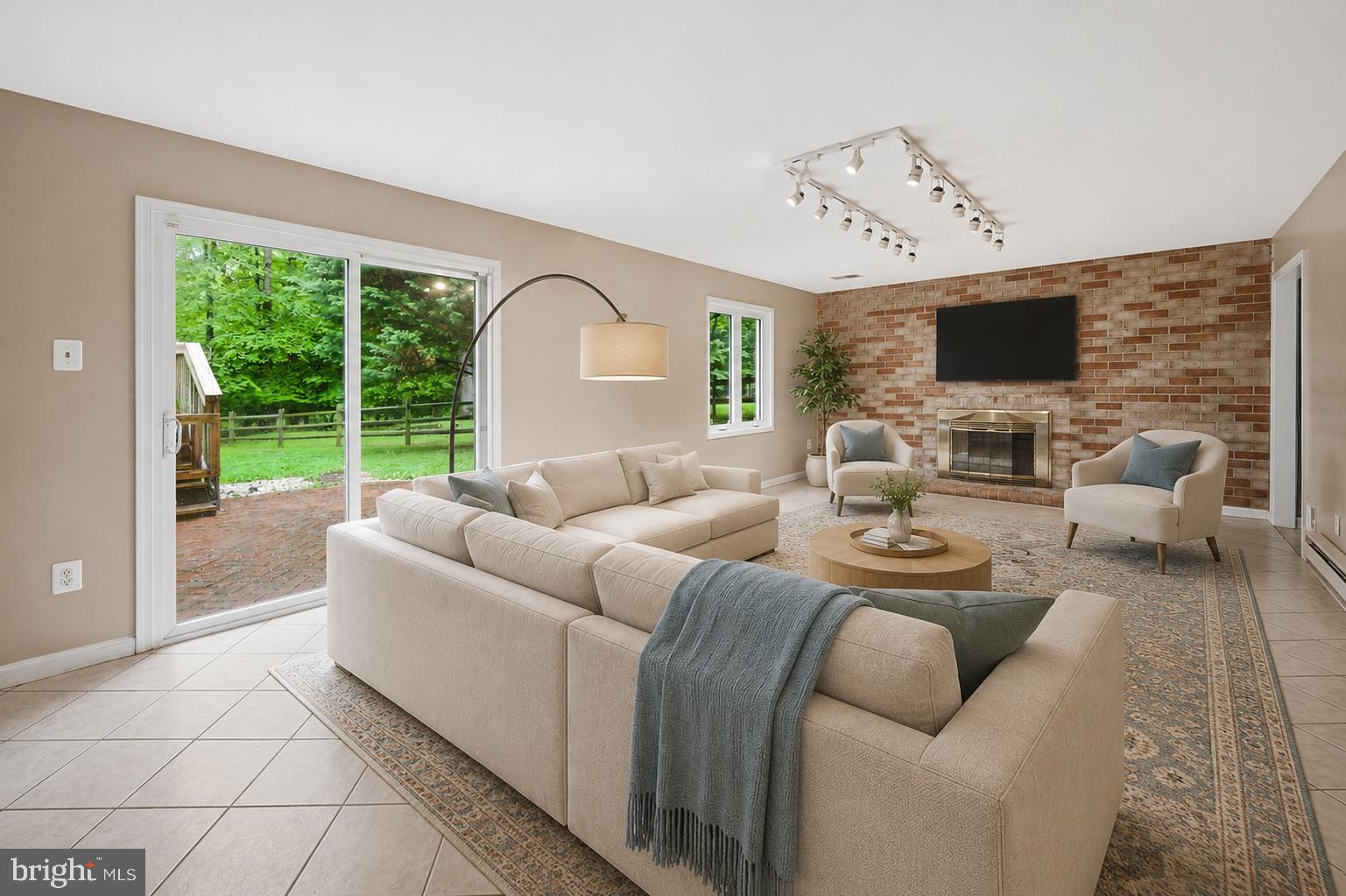 2506 Pinoak Lane Reston, VA 20191 - Photo 21 of 33 a living room with furniture fireplace and a flat screen tv