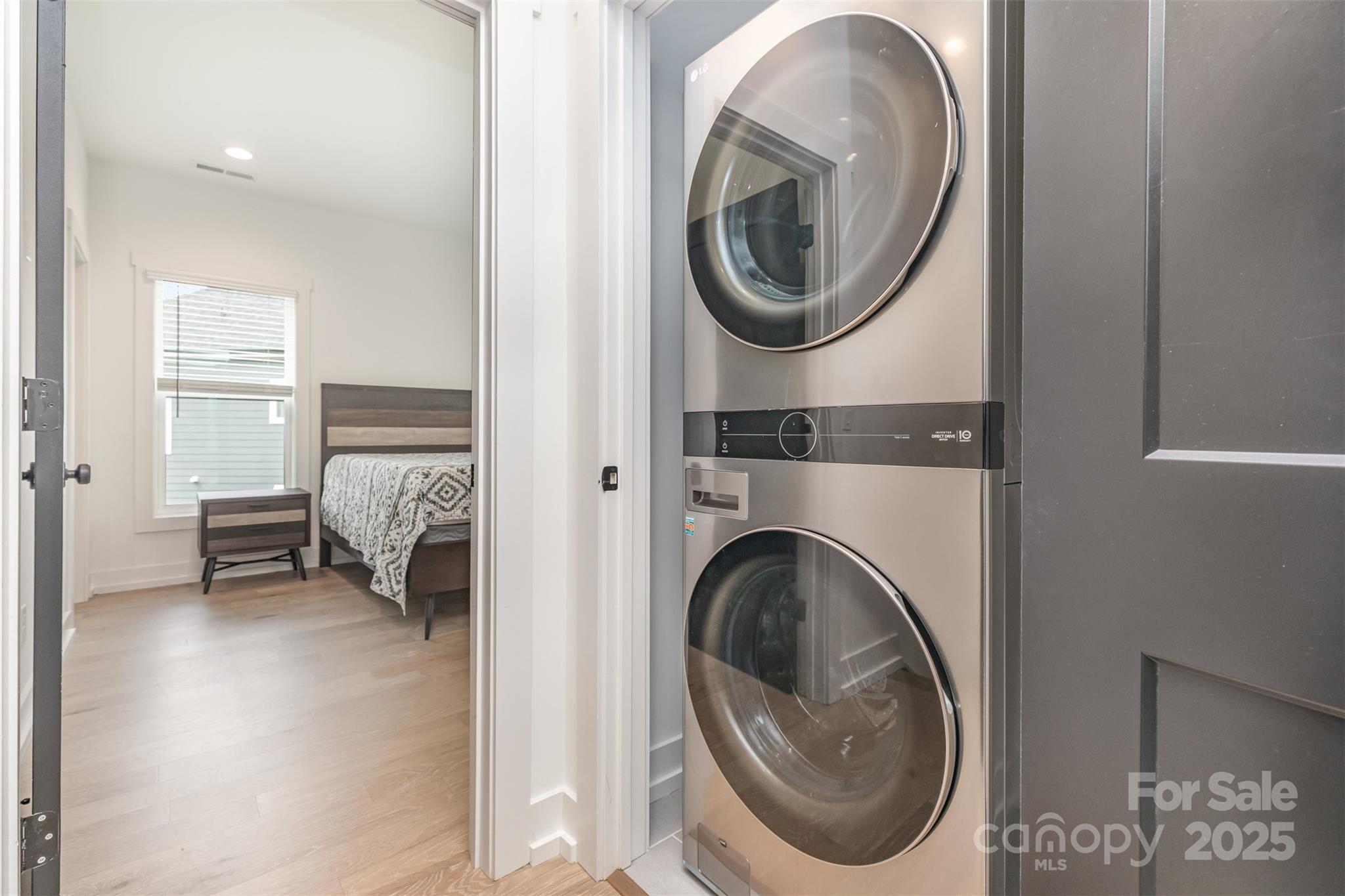 1500 Effingham Road Charlotte, NC 28208 - Photo 21 of 32 a view of a bedroom with washer and dryer