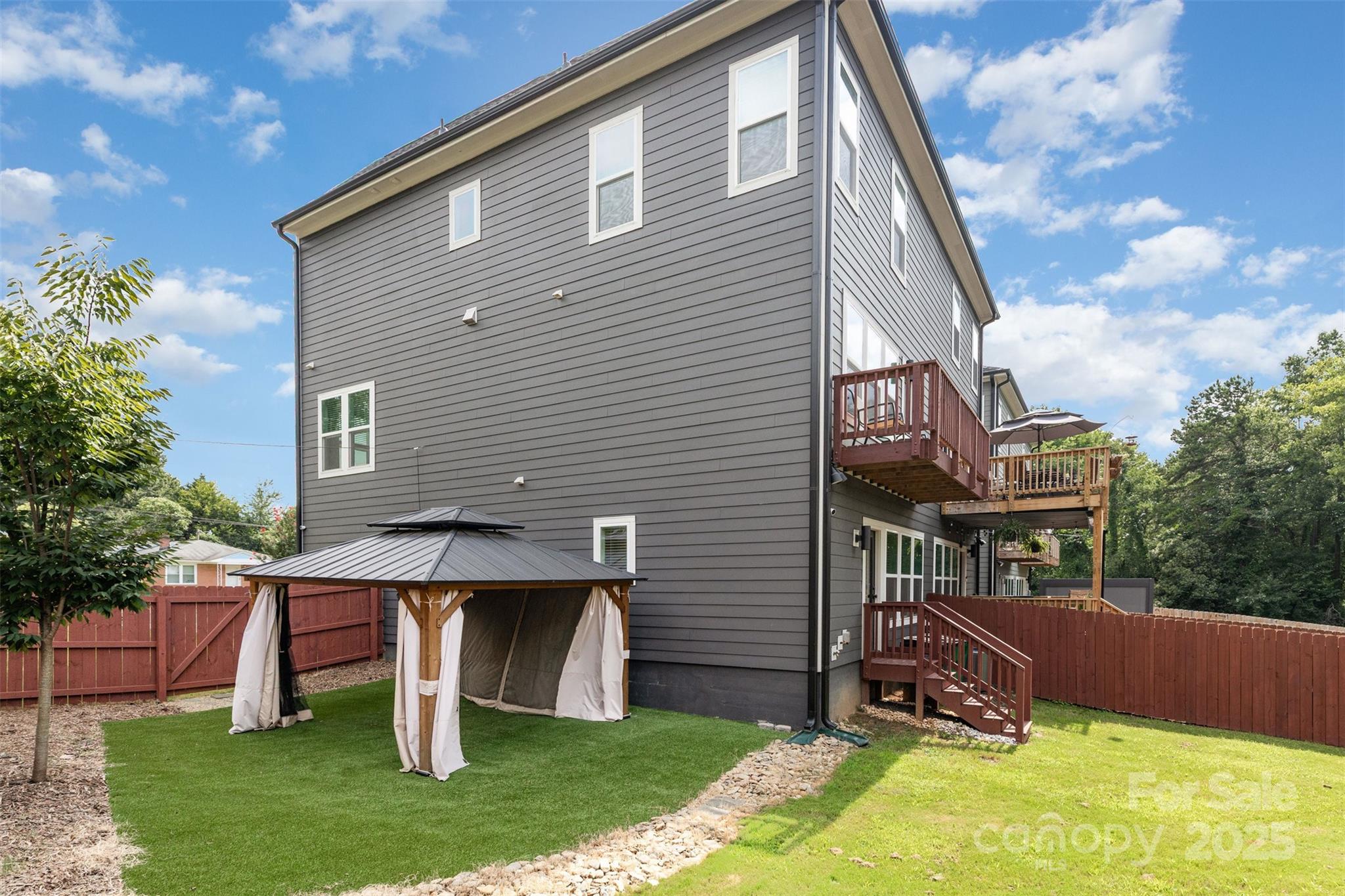 1500 Effingham Road Charlotte, NC 28208 - Photo 29 of 32 a view of house with a yard
