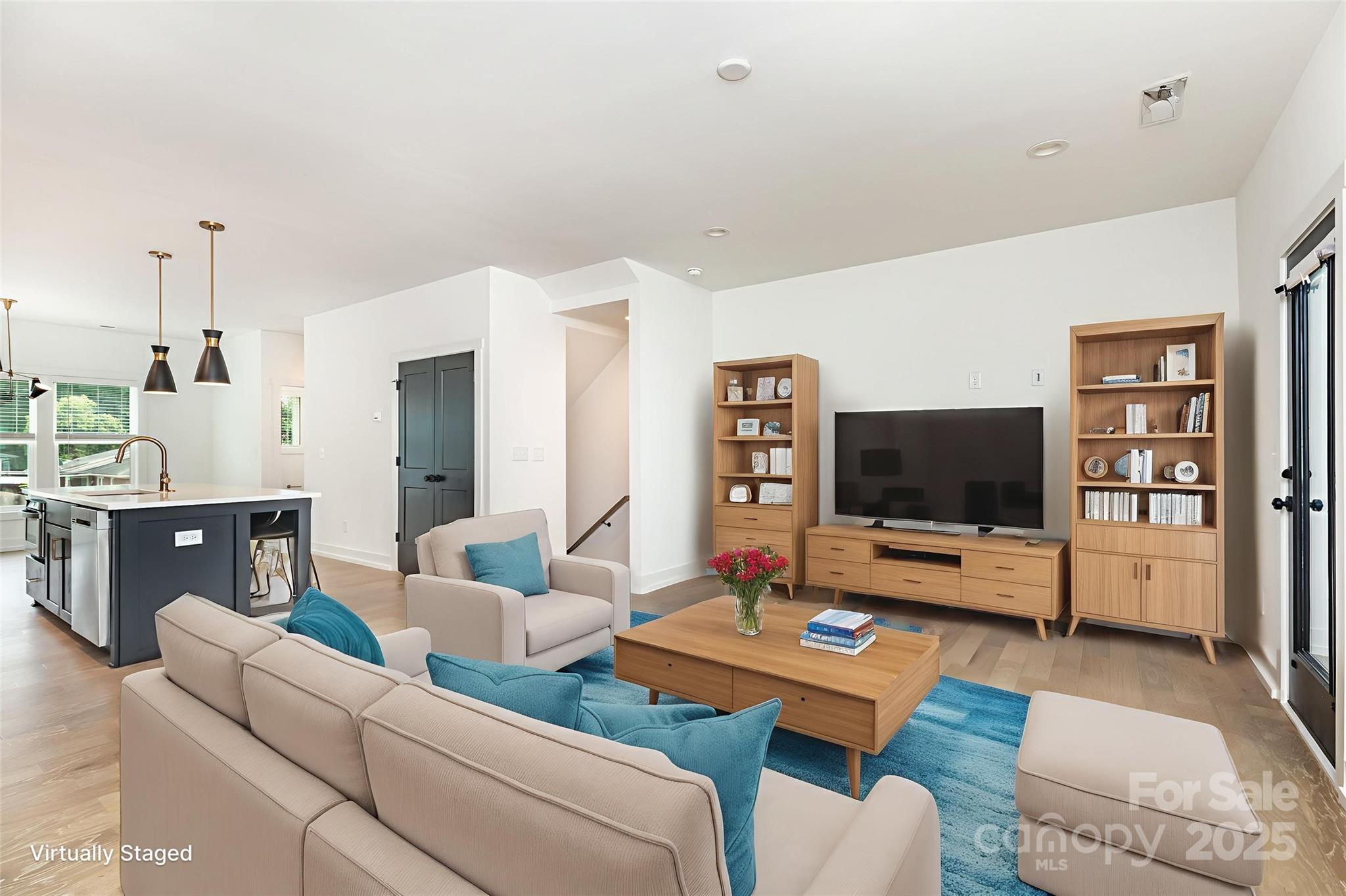 1500 Effingham Road Charlotte, NC 28208 - Photo 7 of 32 a living room with furniture and a flat screen tv