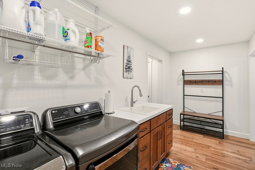 1430 Magnolia Road Southwest Dellroy, OH 44620 - Photo 25 of 50 Spacious laundry area with additional storage and organization space.