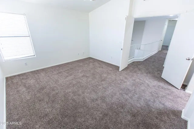 a view of an empty room with window