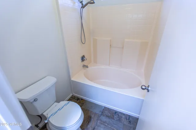 a view of a backyard with cabin