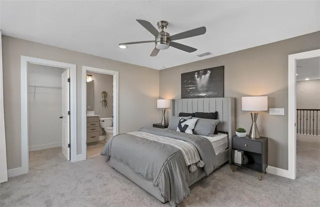 a bedroom with a bed and closet