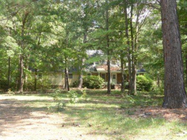 842 Montpelier Road Forsyth, GA 31029 - Photo 1 of 1 a view of a yard with trees