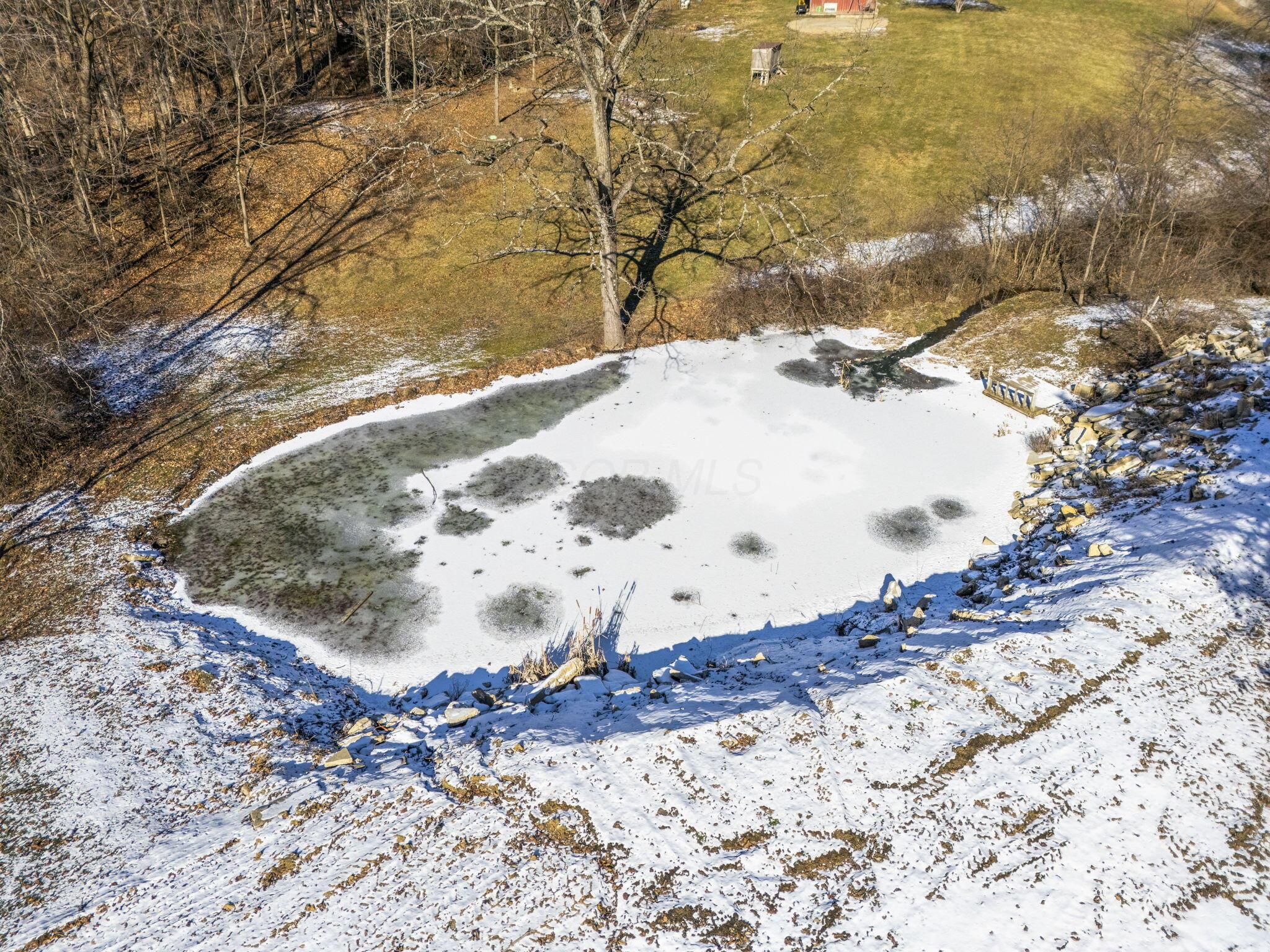 6875 Indian Run Road Northeast Pleasantville, OH 43148 - Photo 11 of 16 Pond Aerial View - 6875 Indian Run Road NE, Rushville, OH 43150