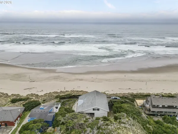 an aerial view of beach and city