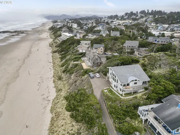 an aerial view of a house with a garden