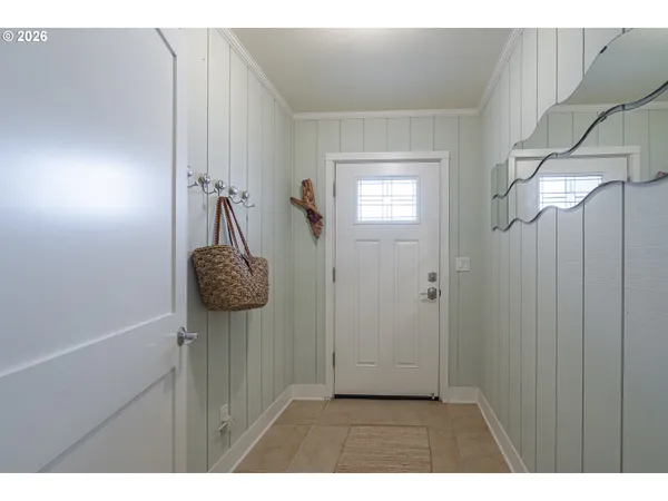 a view of a hallway with entryway