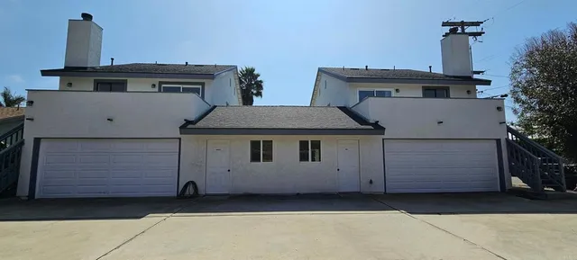 a view of a house with garage