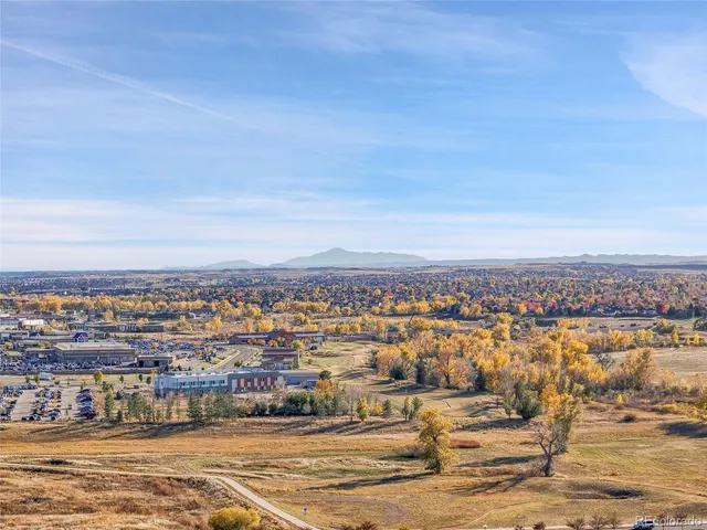 an aerial view of residential building and city view