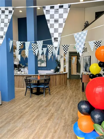 a living room with furniture window and outdoor kitchen view