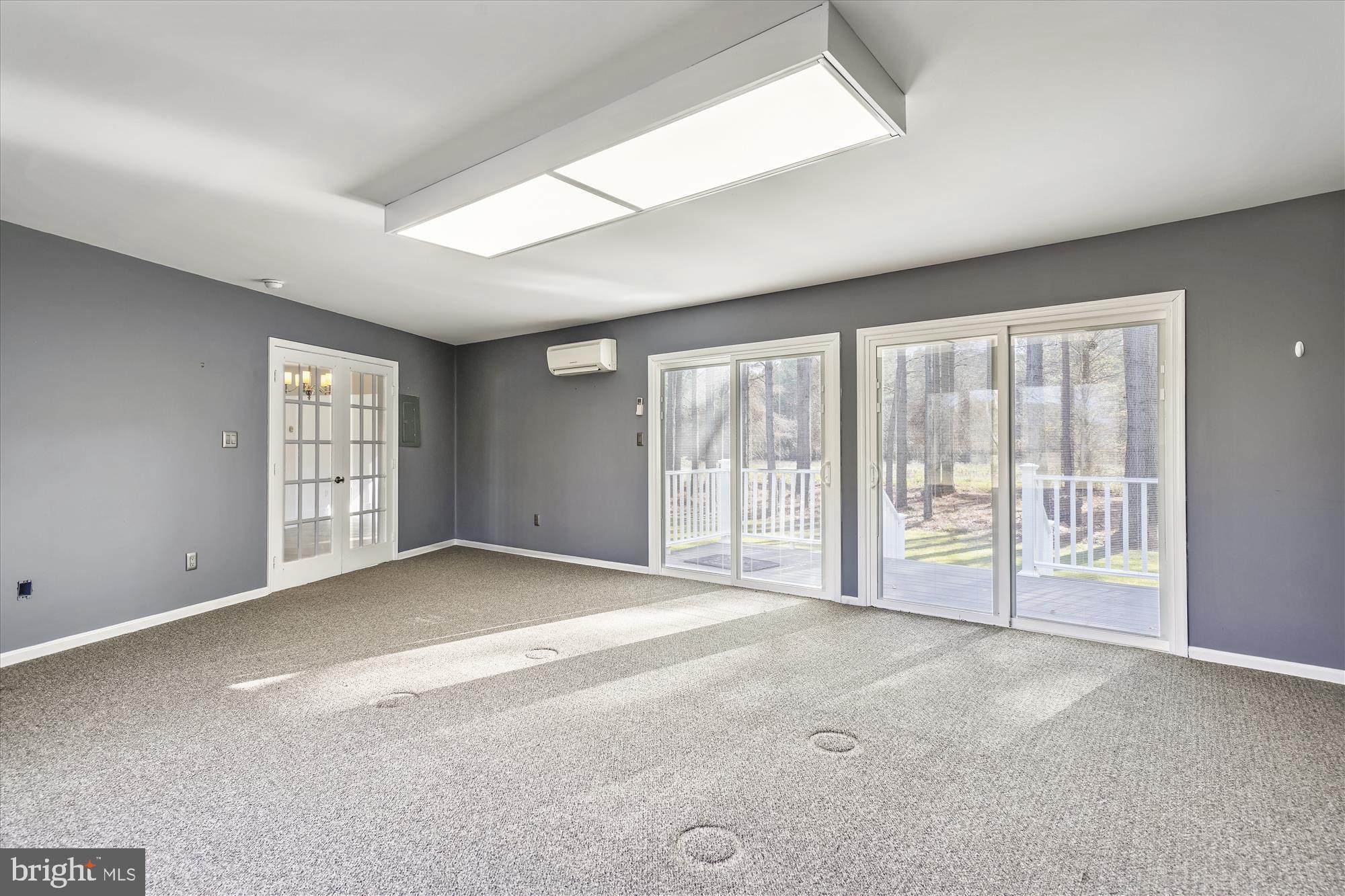 25545 Chance Farm Road St. Michaels, MD 21663 - Photo 33 of 47 Family room with sliding doors leading to deck