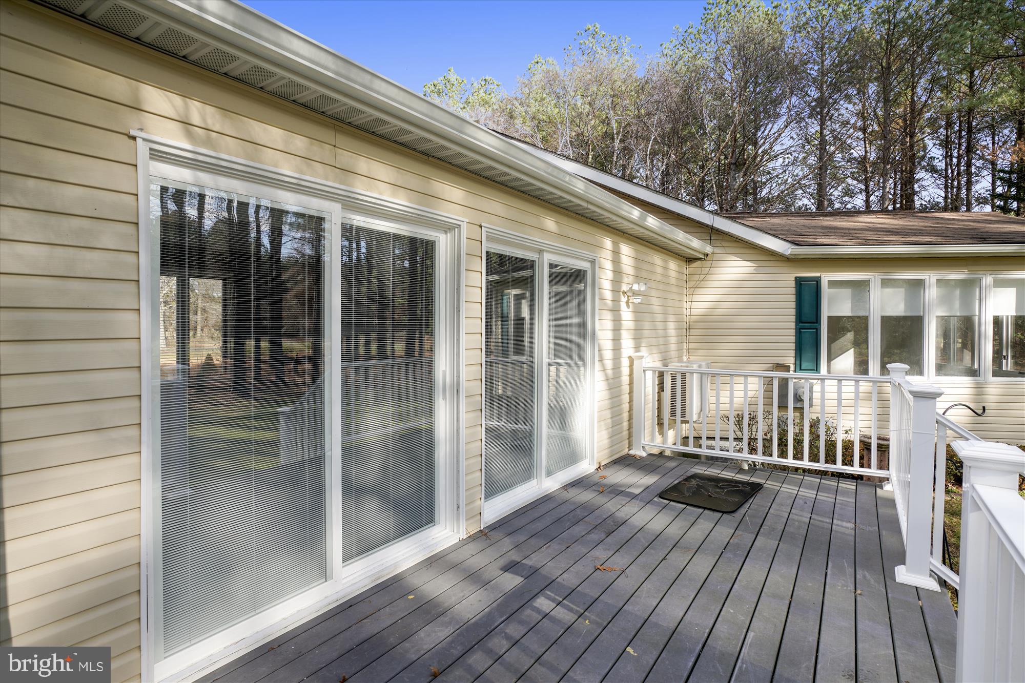 25545 Chance Farm Road St. Michaels, MD 21663 - Photo 34 of 47 Rear deck with sliding doors to family room
