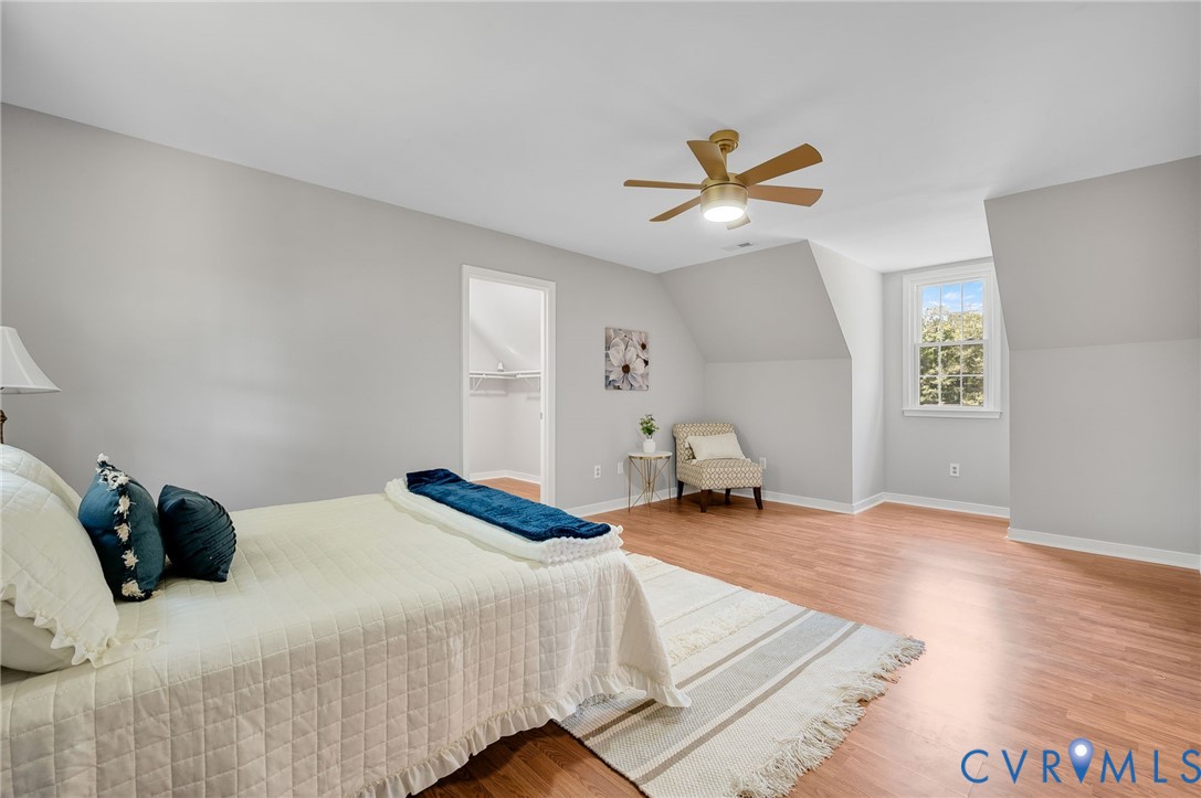 10110 Holly Road Mechanicsville, VA 23116 - Photo 19 of 26 Spacious room featuring wood-finish flooring, a co