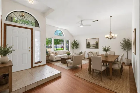 a view of a livingroom with furniture and window