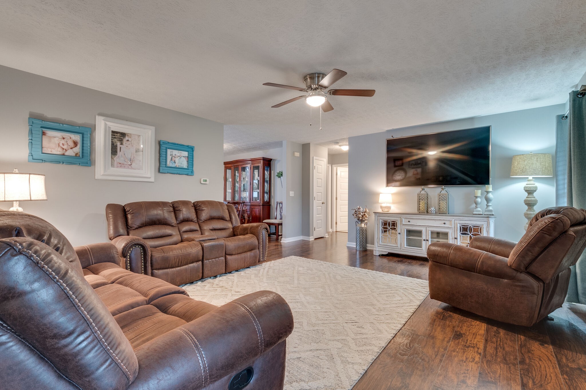 7593 Beech Hill Road Pulaski, TN 38478 - Photo 11 of 40 a living room with furniture and a flat screen tv