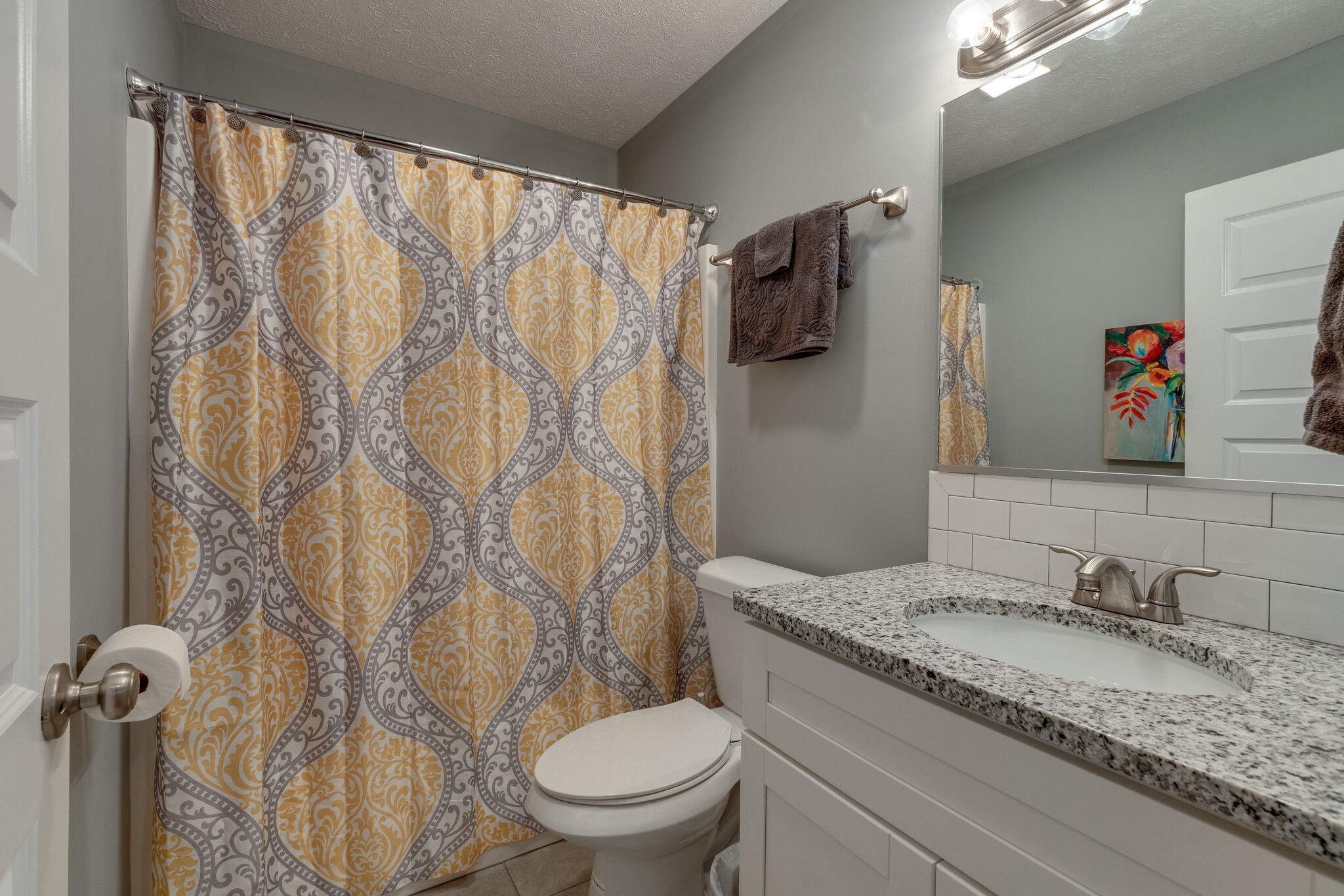 7593 Beech Hill Road Pulaski, TN 38478 - Photo 22 of 40 a bathroom with a granite countertop sink and a mirror