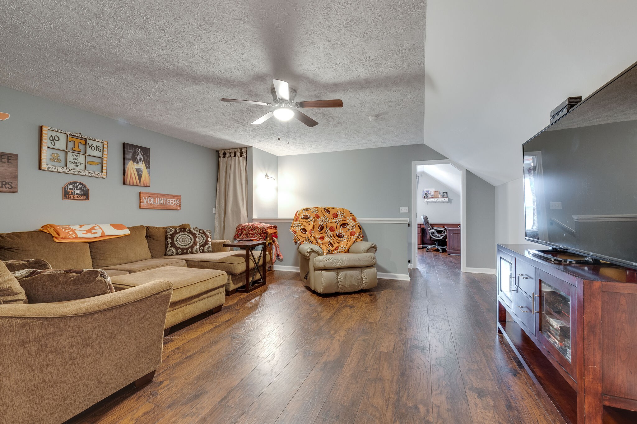 7593 Beech Hill Road Pulaski, TN 38478 - Photo 25 of 40 a living room with furniture and a fireplace