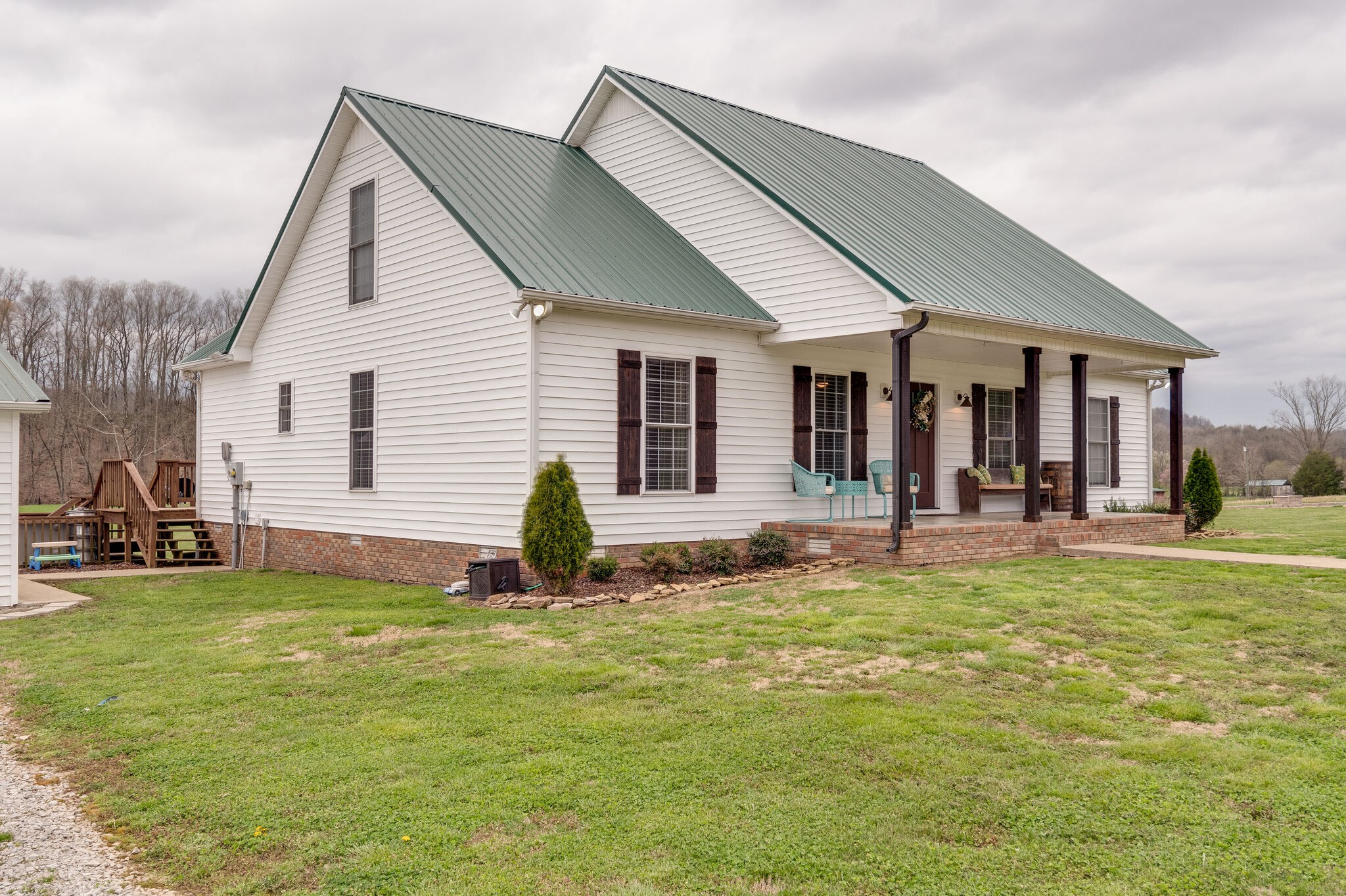7593 Beech Hill Road Pulaski, TN 38478 - Photo 4 of 40 a view of a house with a patio and a yard