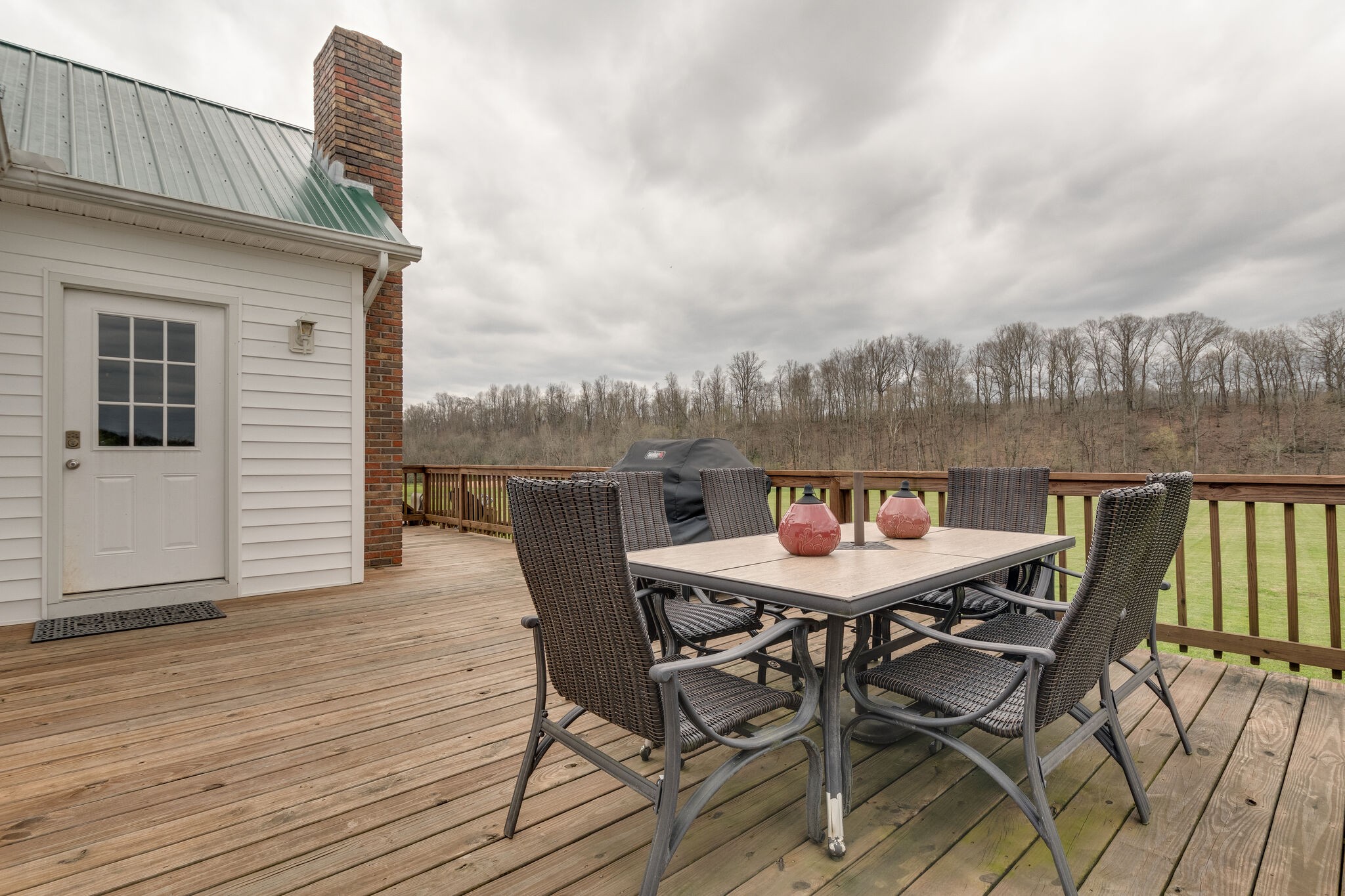 7593 Beech Hill Road Pulaski, TN 38478 - Photo 33 of 40 a dining room with furniture and wooden floor
