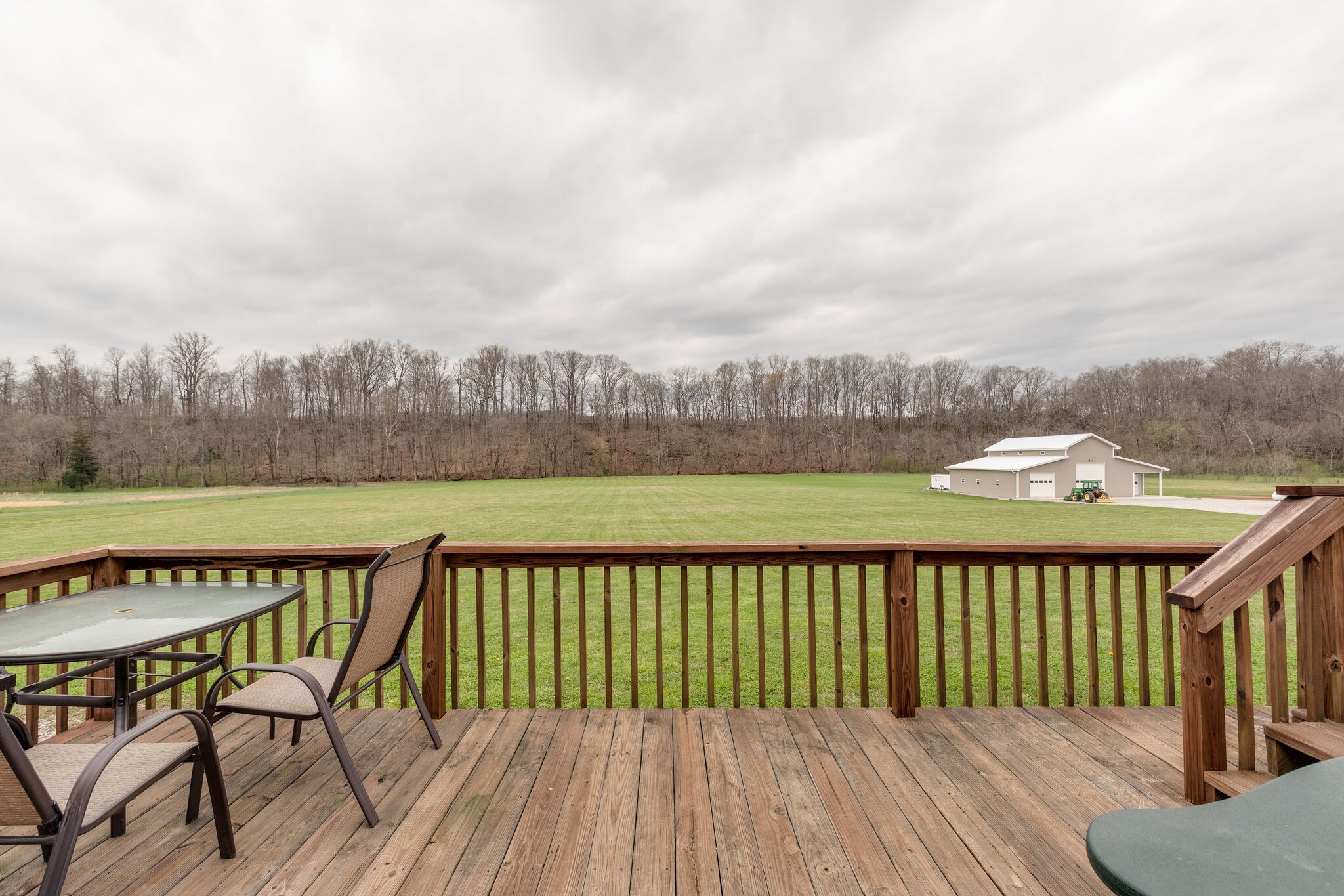 7593 Beech Hill Road Pulaski, TN 38478 - Photo 35 of 40 a view of a roof deck with wooden floor and fence