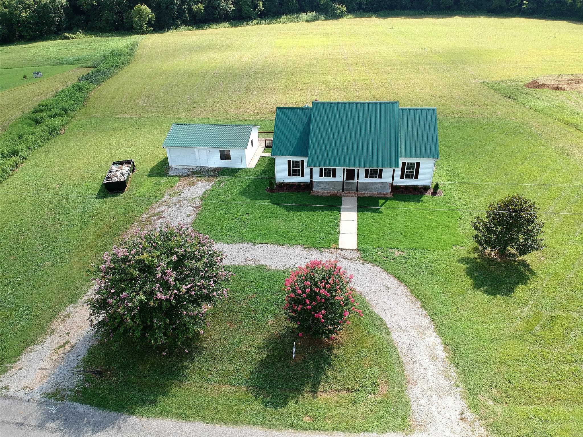 7593 Beech Hill Road Pulaski, TN 38478 - Photo 38 of 40 a view of a swimming pool with a yard