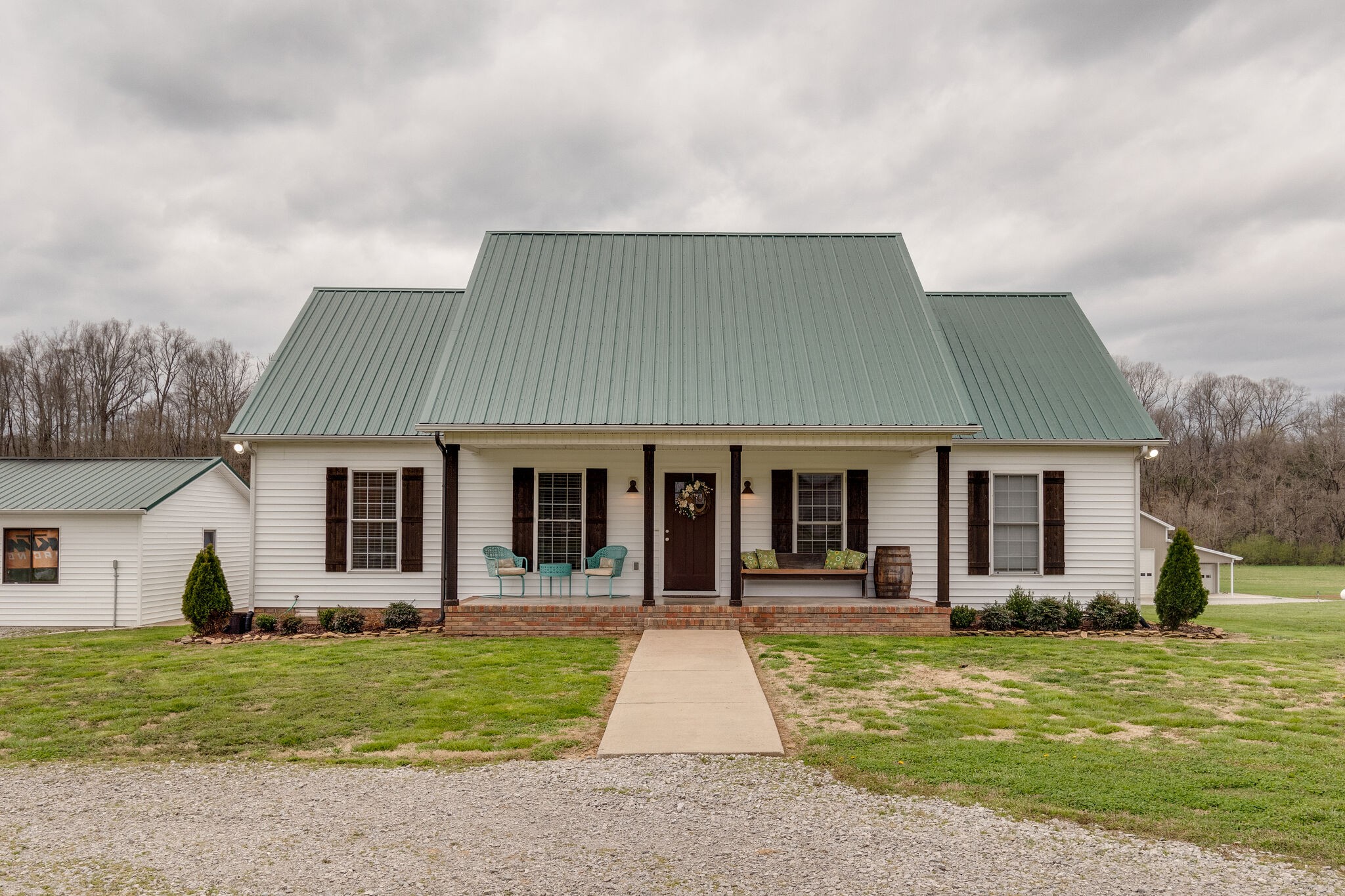 7593 Beech Hill Road Pulaski, TN 38478 - Photo 5 of 40 a front view of the house with a yard