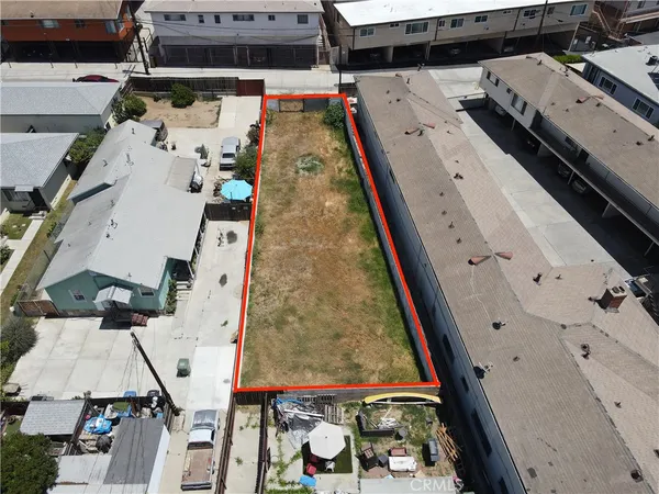an aerial view of a residential apartment building with entryway