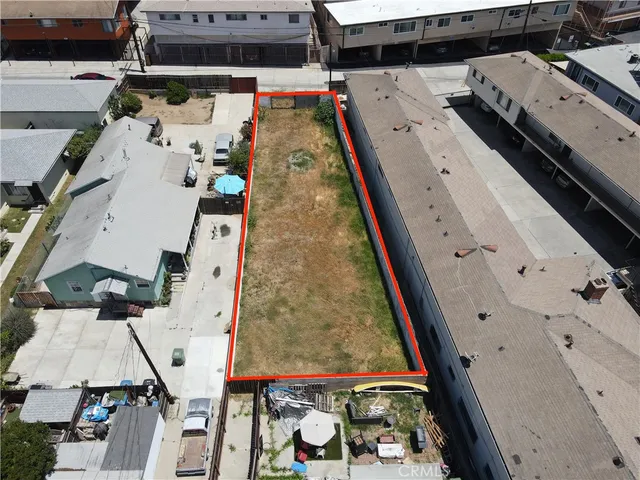 an aerial view of a residential apartment building with entryway