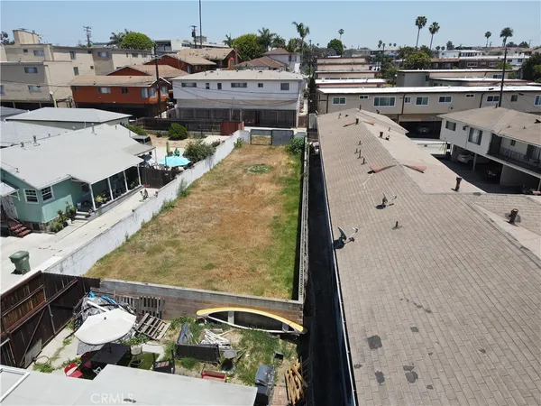 a aerial view of a balcony with chairs