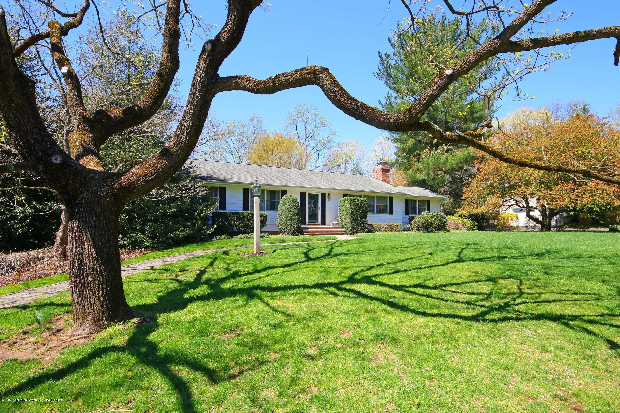 81 Mallard Road Middletown, NJ 07748 - Photo 2 of 25 a front view of a house with a yard