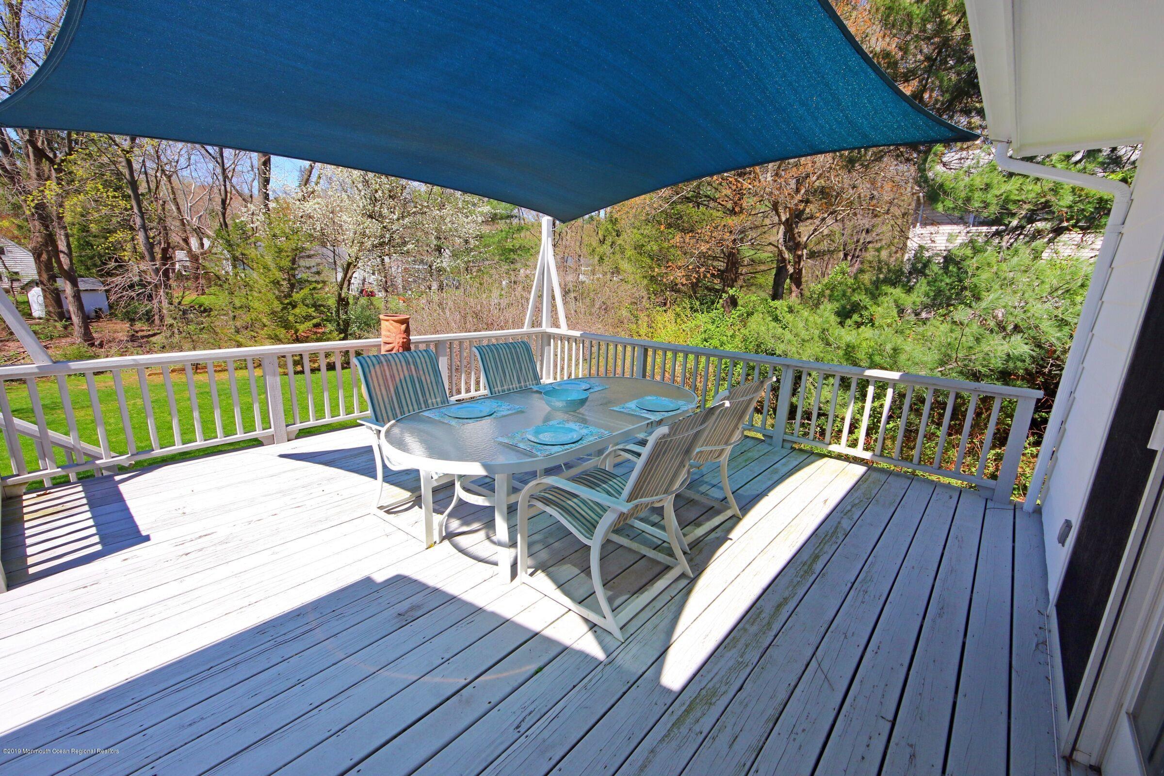 81 Mallard Road Middletown, NJ 07748 - Photo 25 of 25 a view of a patio with wooden floor