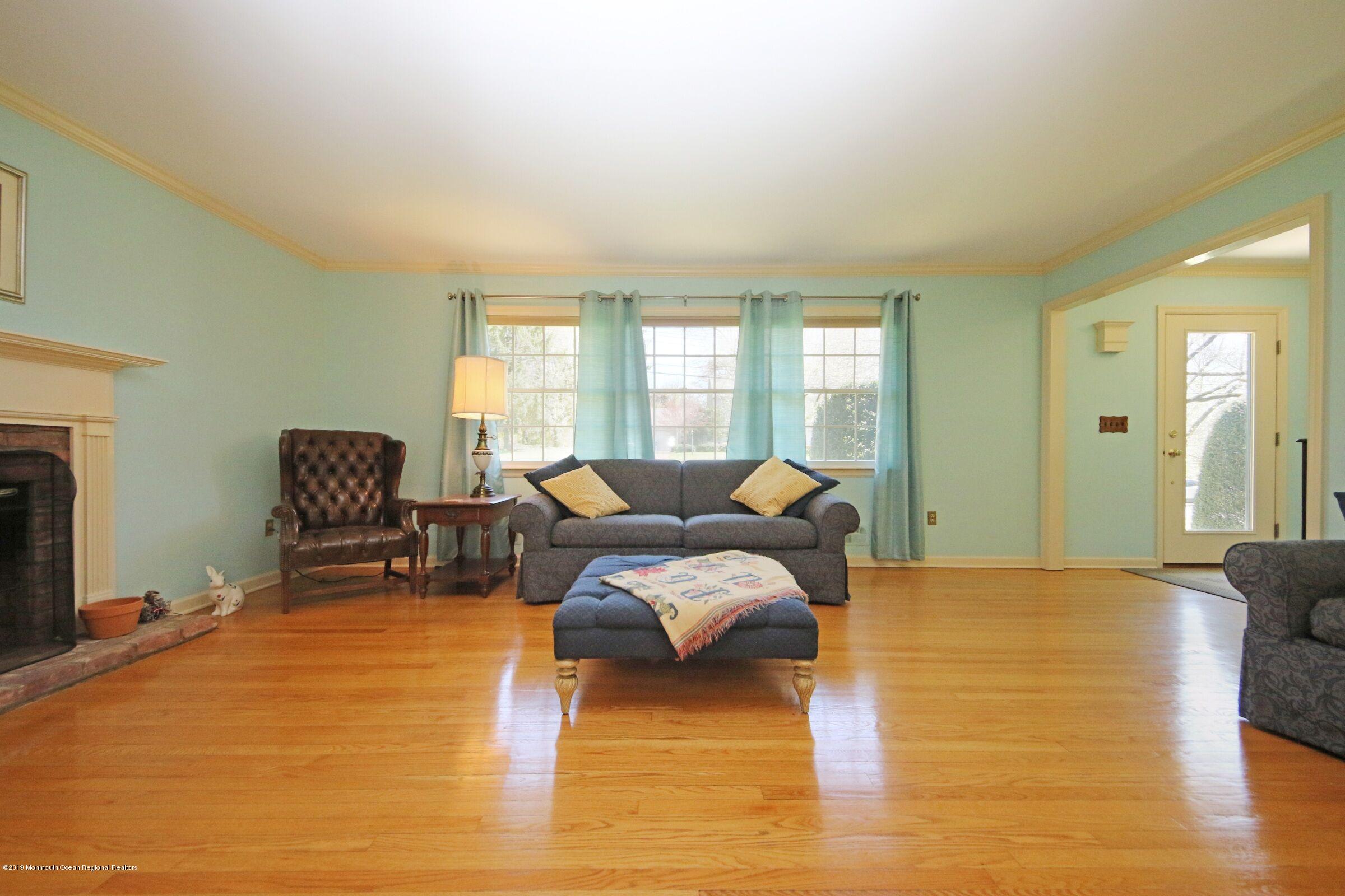 81 Mallard Road Middletown, NJ 07748 - Photo 7 of 25 a living room with furniture and a flat screen tv