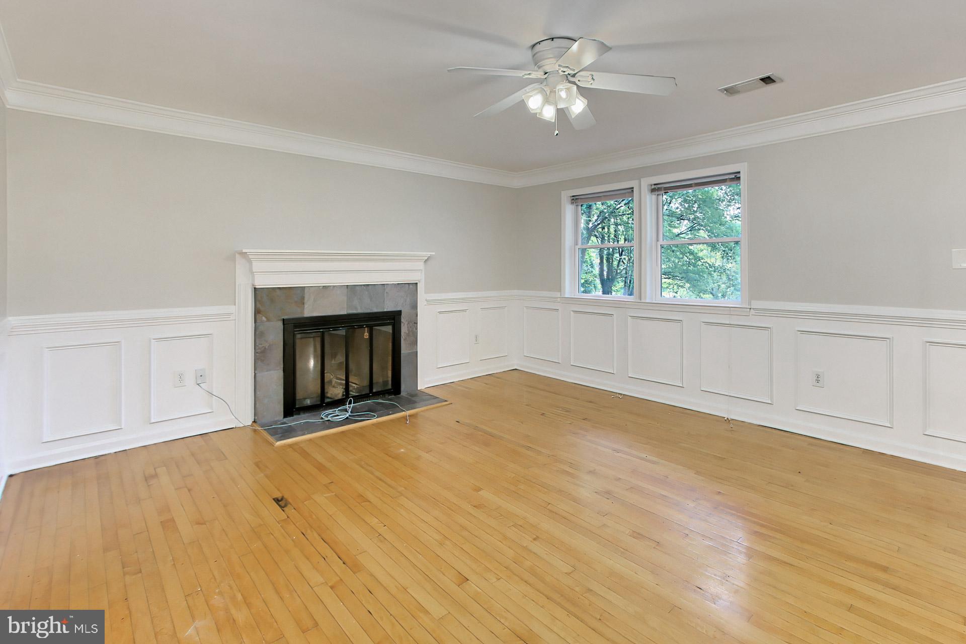 Family Room w/ Wood Burning Fireplace