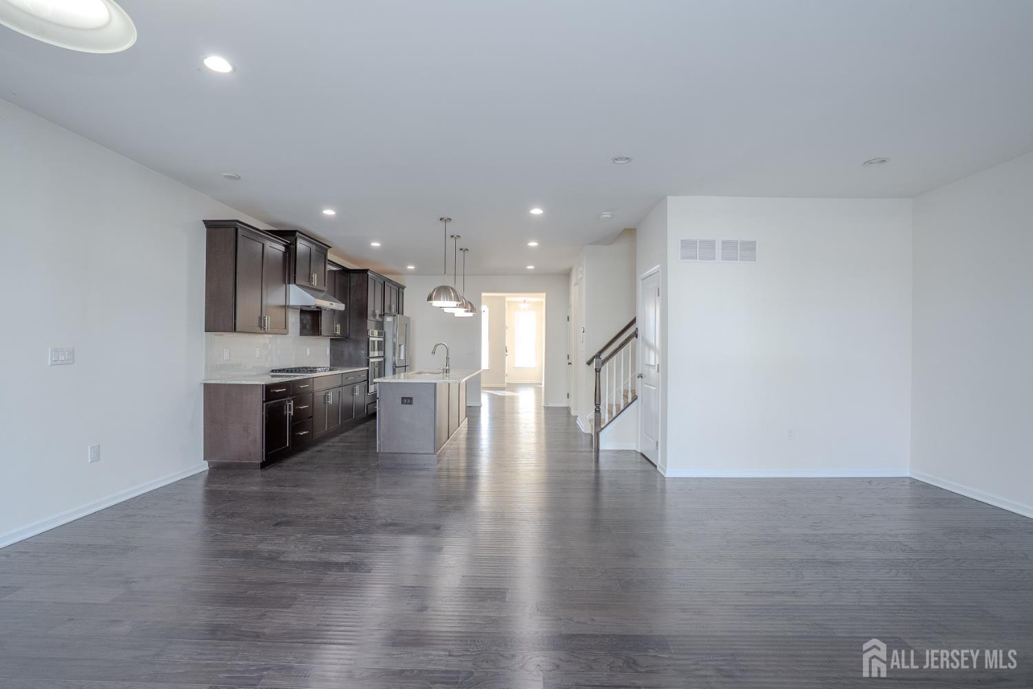 16 Clover Lane Monroe Township, NJ 08831 - Photo 13 of 36 a view of a kitchen with a sink and a large window