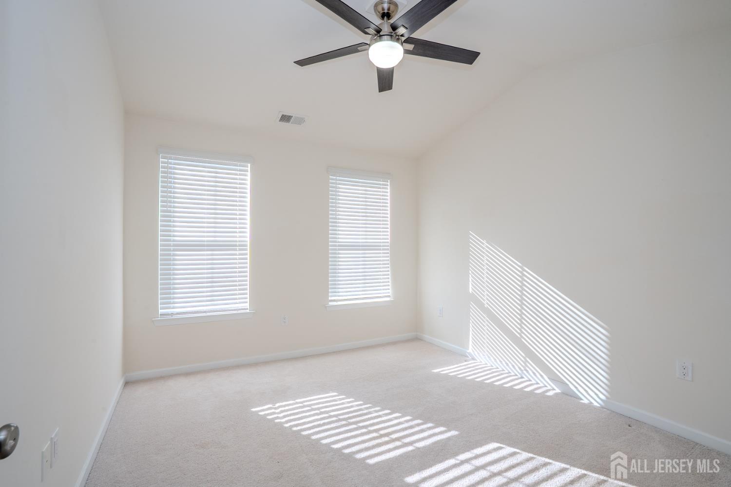 16 Clover Lane Monroe Township, NJ 08831 - Photo 21 of 36 a view of an empty room with a window