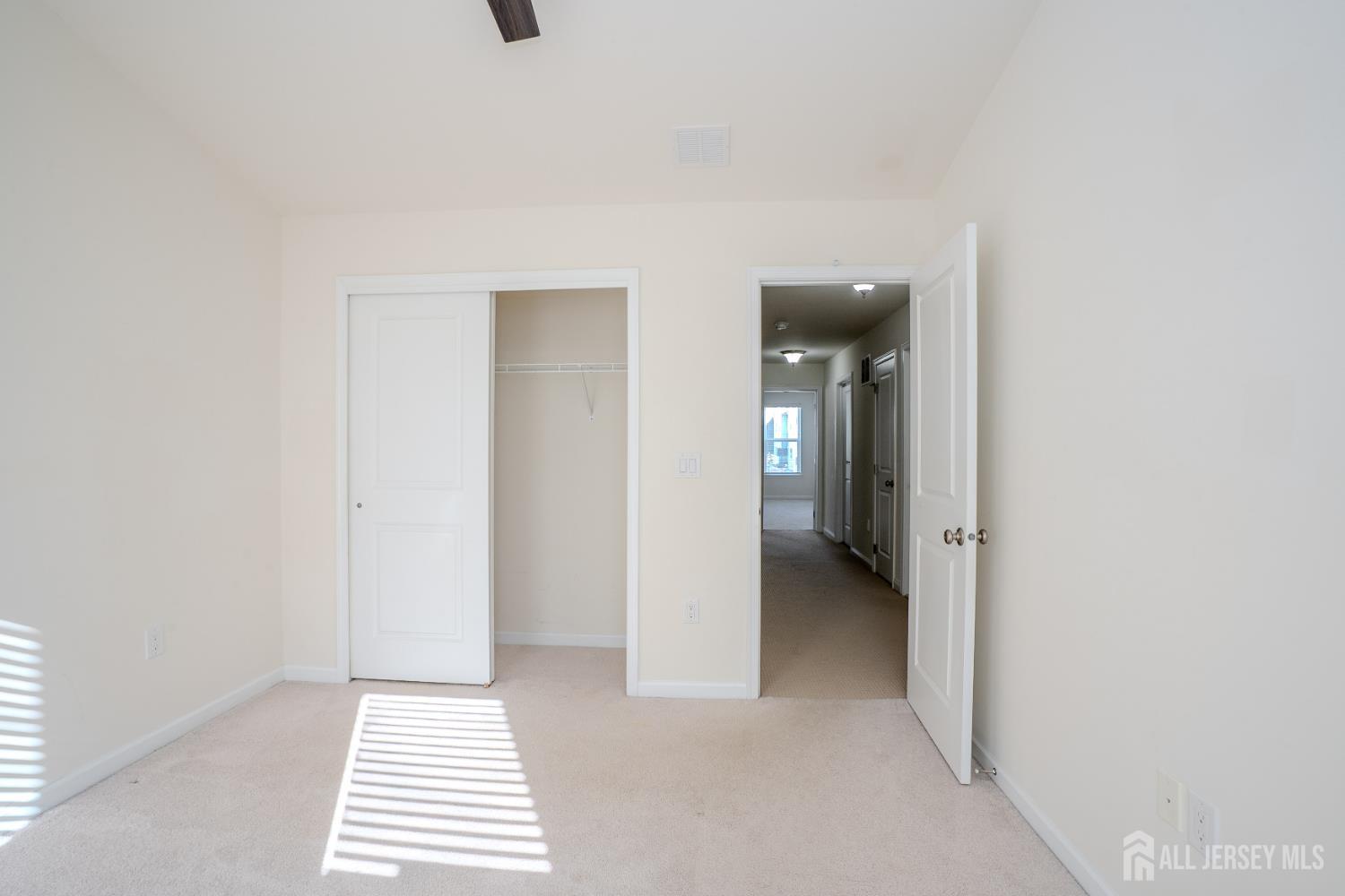 16 Clover Lane Monroe Township, NJ 08831 - Photo 22 of 36 a view of an empty room and window