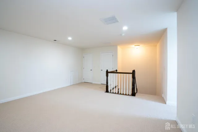 a view of room with a hallway